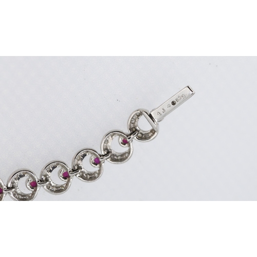 55 - Attractively Detailed Diamond and Ruby Set Crecent Form Ladies Bracelet Mounted in 18 Carat White Go... 