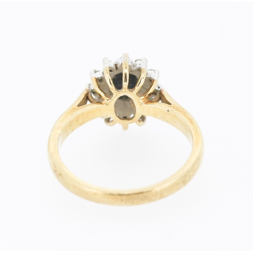 56 - Sapphire Centre Stone Ring with Diamond Set Surround Mounted in 9 Carat Yellow Gold Ring Size J and ... 
