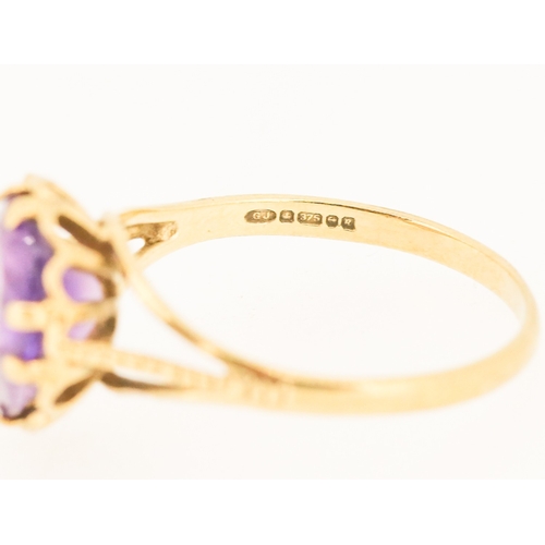 8 - Amethyst Set Single Stone Ring Mounted in 9 Carat Yellow Gold Amethyst 10mm by 8mm Ring Size P