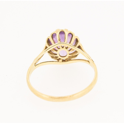 8 - Amethyst Set Single Stone Ring Mounted in 9 Carat Yellow Gold Amethyst 10mm by 8mm Ring Size P