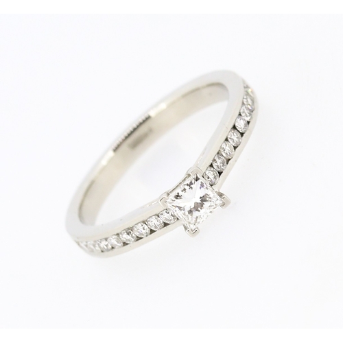 36 - Square Brilliant Cut Solitaire with Further Diamonds Set to Band Mounted in Platinum Main Diamond 0.... 