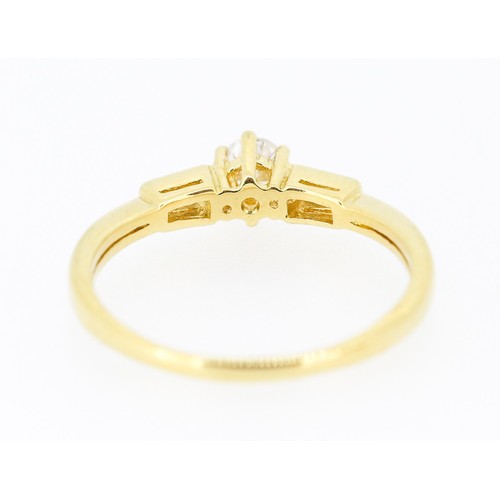 37 - Diamond Solitaire with Tapered Baguette Cut Diamonds Set to Shoulders Mounted in 18 Carat Yellow Gol... 