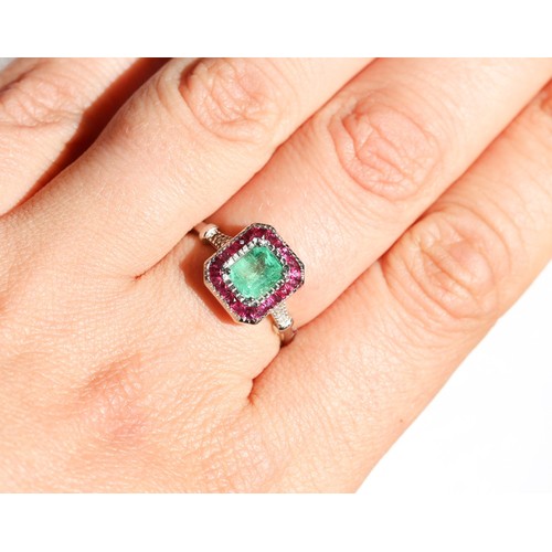 52 - Attractively Detailed Emerald Centre Stone Ring with Ruby Set Surround and Further Diamonds Set to S... 
