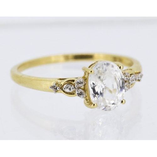 White Sapphire Set Ring with Further Insets to Shoulders Mounted in 9 Carat Yellow Gold Ring Size P and a Half