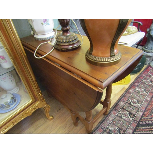 243 - Oak Drop Leaf Table Turned Supports Approximately 32 Inches Wide