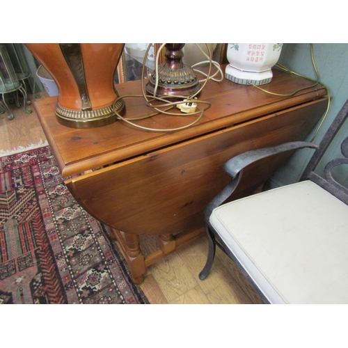 243 - Oak Drop Leaf Table Turned Supports Approximately 32 Inches Wide