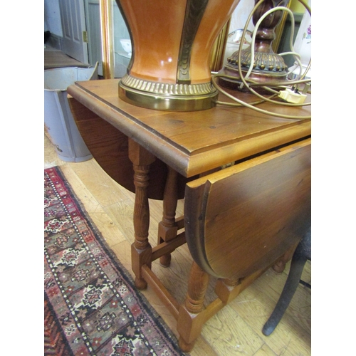 243 - Oak Drop Leaf Table Turned Supports Approximately 32 Inches Wide
