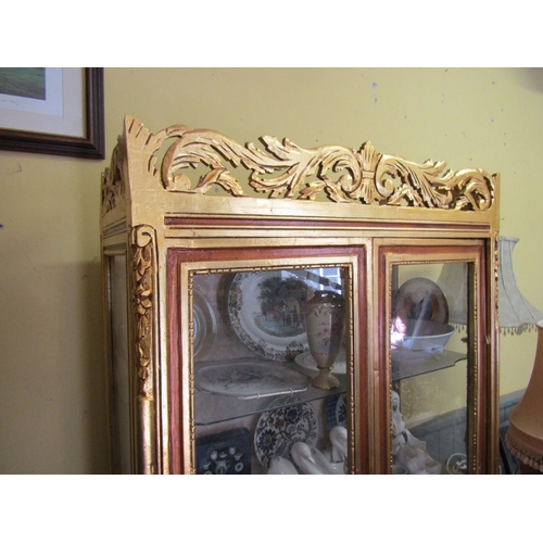 246 - Gilded Twin Door Display Cabinet with Upper Carved Decoration Approximately 40 Inches Wide x 6ft 6 I... 