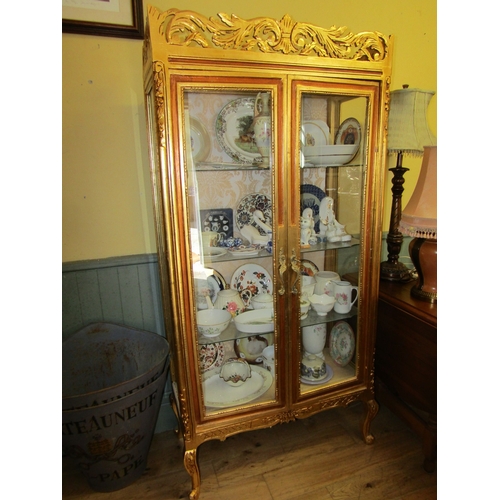 246 - Gilded Twin Door Display Cabinet with Upper Carved Decoration Approximately 40 Inches Wide x 6ft 6 I... 