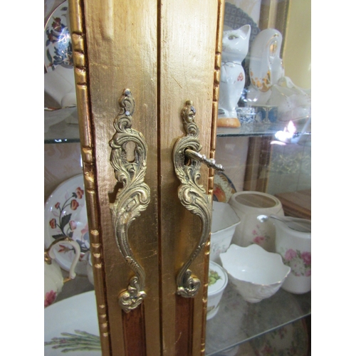 246 - Gilded Twin Door Display Cabinet with Upper Carved Decoration Approximately 40 Inches Wide x 6ft 6 I... 