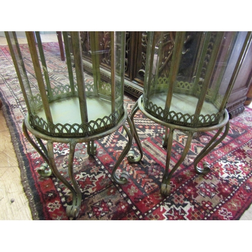 250 - Pair of Glazed Metal Lanterns on Shaped Supports each Approximately 32 Inches High