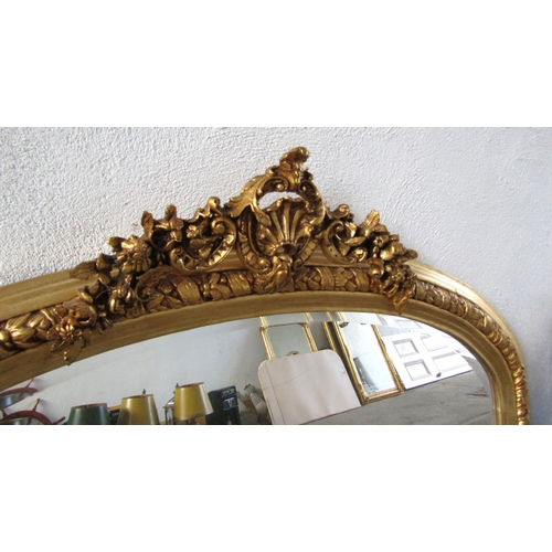253 - Arch Top Gilded Over Mantel Mirror with Upper Cartouche Decoration Decorated Side Ends Approximately... 