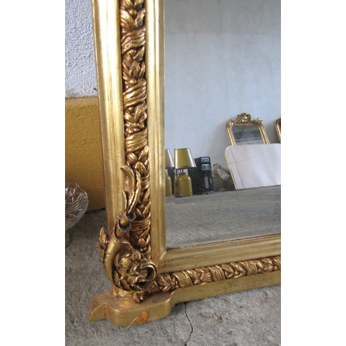 253 - Arch Top Gilded Over Mantel Mirror with Upper Cartouche Decoration Decorated Side Ends Approximately... 