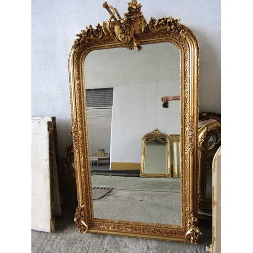 257 - Gilded Rectangular Form Wall Mirror with Upper Carved Decoration Approximately 6ft 2 Inches High x 2... 