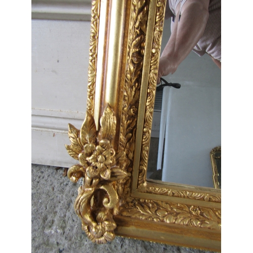 258 - Gilded Rectangular Form Wall Mirror with Upper Carved Decoration Approximately 56 Inches Wide x 2ft ... 