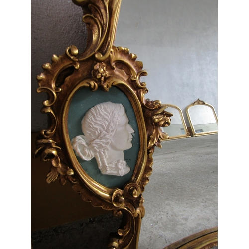 260 - Gilded Shaped Form Wall Mirror Upper Cartouche Decoration with Side Profiles Approximately 4ft 6 Inc... 