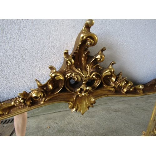 260 - Gilded Shaped Form Wall Mirror Upper Cartouche Decoration with Side Profiles Approximately 4ft 6 Inc... 
