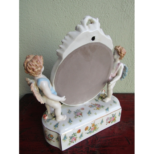 283 - Continental Porcelain Dressing Table Mirror with Cherub Side Supports Approximately 14 Inches Wide x... 