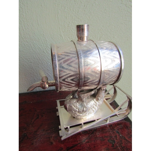 285 - Silver Plated Spirit Barrell with Bear Motif Support on Sled Attractively Detailed Approximately 9 I... 