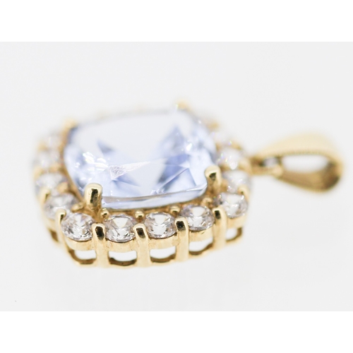 12 - Aquamarine Set Pendant with White Topaz Set Surround Mounted in 9 Carat Yellow Gold 1.5cm High