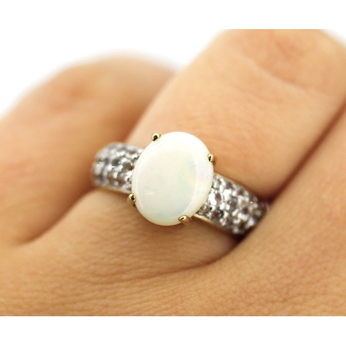 13 - Opal Set Ring with Gemstone Cluster Set Shoulders Mounted in 9 Carat Yellow Gold Ring Size N