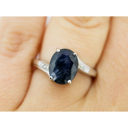 14 - Sapphire Set Wrap Around Form Ring with Diamond Insets to Shoulders Mounted in 9 Carat White Gold Sa... 