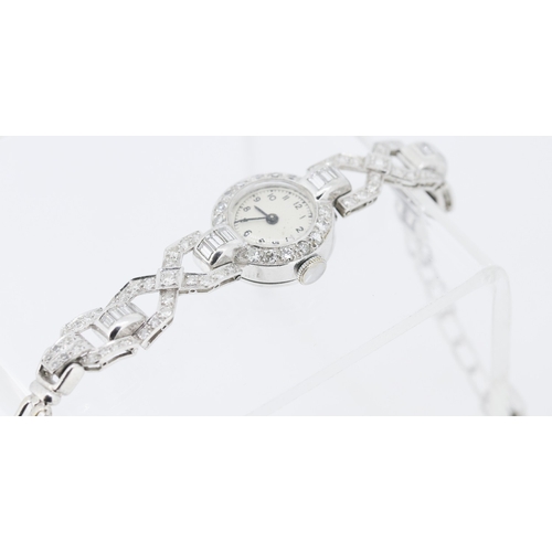 16 - Finely Detailed Round Cut and Baguette Cut Diamond Set Ladies Evening Watch Mounted in Platinum with... 
