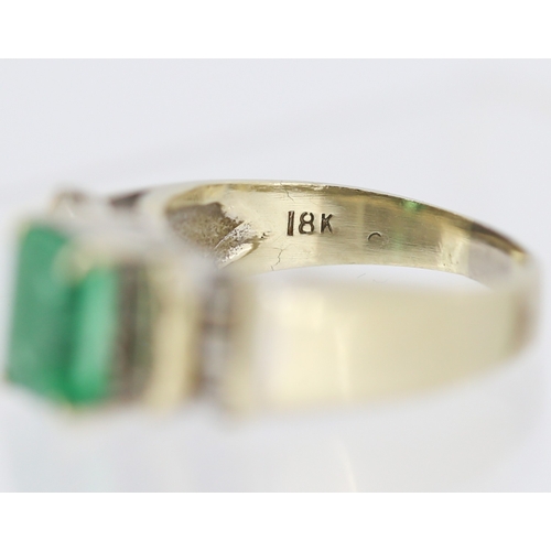 18 - Emerald Set Ring with Tapered Baguette Cut Diamond Clusters Set to Shoulders Mounted in 18 Carat Yel... 