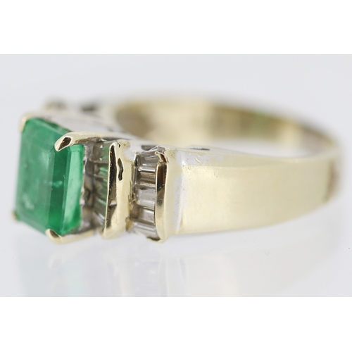 18 - Emerald Set Ring with Tapered Baguette Cut Diamond Clusters Set to Shoulders Mounted in 18 Carat Yel... 