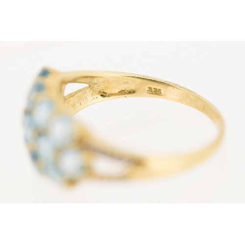 2 - Blue Topaz Set Cluster Ring with Diamond Inset to Shoulders Mounted in 9 Carat Yellow Gold Ring Size... 