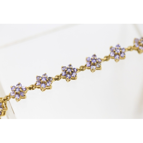 21 - Pale Tanzanite Cluster Daisy Form Set Bracelet Mounted in 9 Carat Yellow Gold 18.5cm Long