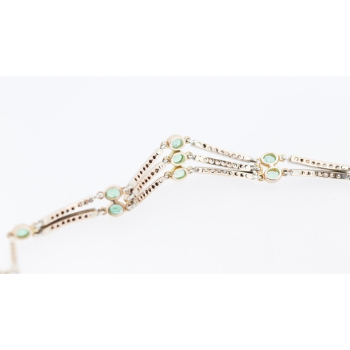 35 - Finely Detailed Nine Stone Emerald and Diamond Set Bracelet Mounted in 14 Carat Rose Gold 19cm Long