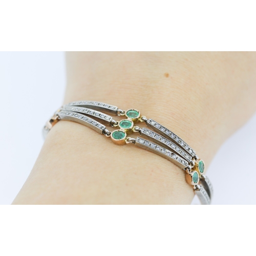 35 - Finely Detailed Nine Stone Emerald and Diamond Set Bracelet Mounted in 14 Carat Rose Gold 19cm Long