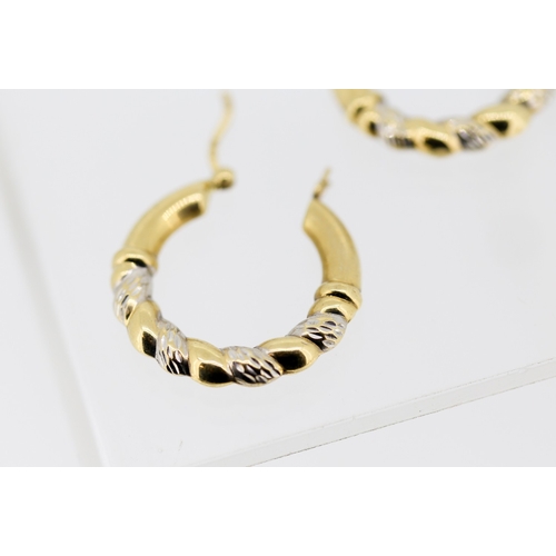 44 - Pair of 9 Carat Yellow and White Gold Twist Form Hoop Earrings 2.5cm High