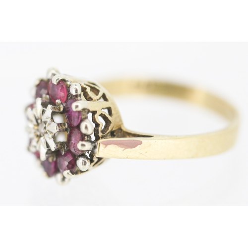 46 - Ruby Set Cluster Ring with Diamond Inset Mounted in 9 Carat Yellow Gold Ring Size N