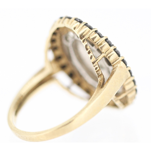 50 - Round Cut and Tapered Baguette Cut Diamond Set Cluster Ring with Sapphire Set Halo Surround Mounted ... 