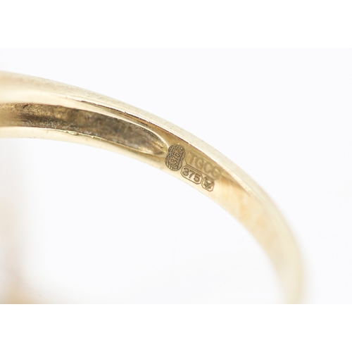 50 - Round Cut and Tapered Baguette Cut Diamond Set Cluster Ring with Sapphire Set Halo Surround Mounted ... 