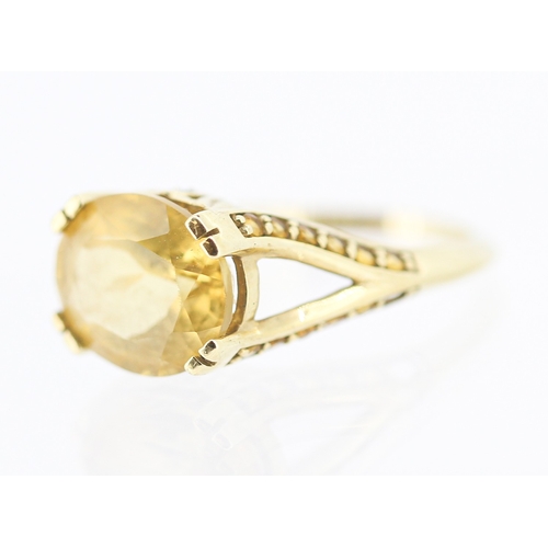 57 - Citrine Set Ring with Further Citrine and Diamond Inset to Shoulders Mounted in 9 Carat Yellow Gold ... 