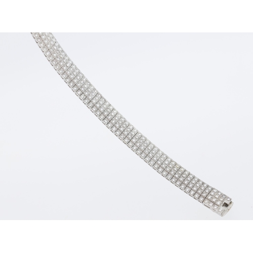 60 - Finely Detailed Diamond Four Row Cluster Set Bracelet Mounted in 18 Carat White Gold Total Diamond C... 