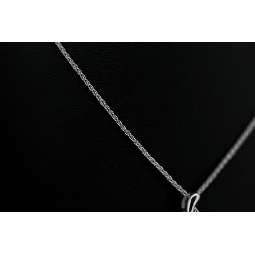 9 - Diamond Solitaire Ribbon Form Pendant Mounted in 18 Carat White Gold 1.5cm High Set on 18 Carat Whit... 
