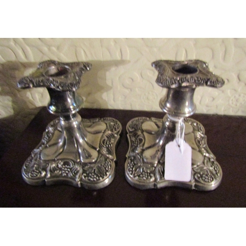 108 - Pair of Old Sheffield Plate Rococo Form Candle Rests