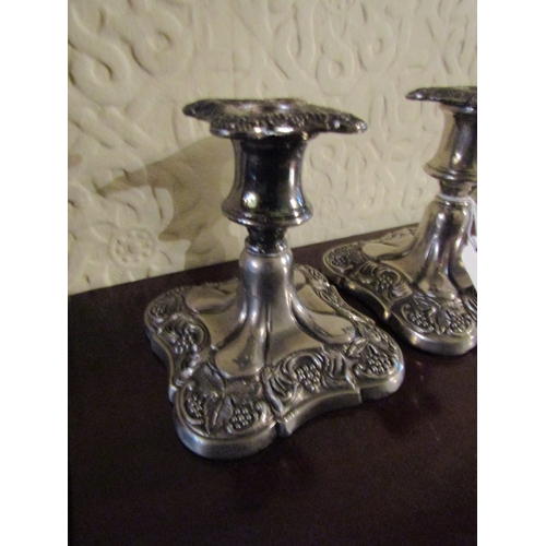 108 - Pair of Old Sheffield Plate Rococo Form Candle Rests