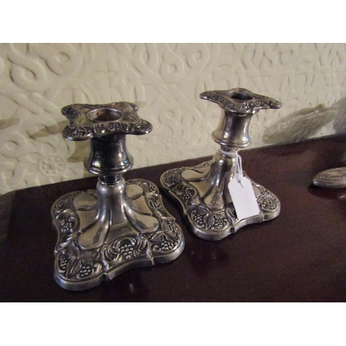 108 - Pair of Old Sheffield Plate Rococo Form Candle Rests