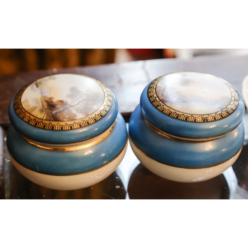 42 - Pair of Finely Detailed Porcelain Table Boxes with Original Covers Decorated with River Scenes Hand ... 