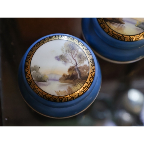 42 - Pair of Finely Detailed Porcelain Table Boxes with Original Covers Decorated with River Scenes Hand ... 