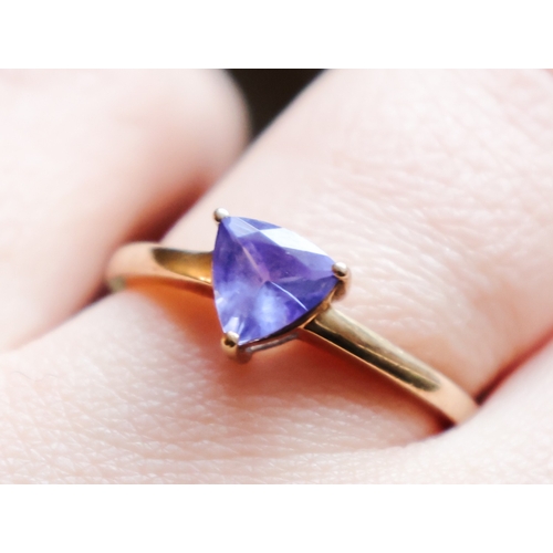 50 - Nine Carat Yellow Gold Tanzanite Center Stone Ladies Ring Band Size P and a Half