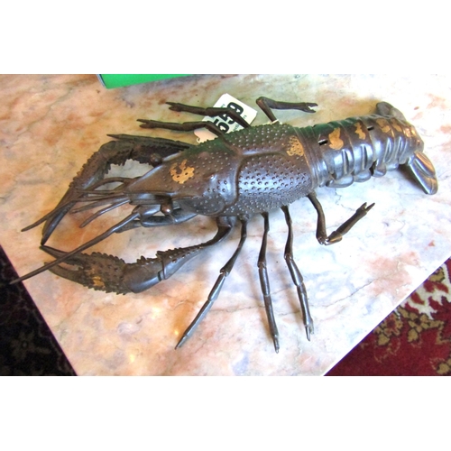 Japanese Bronze Articulated Sculpture of Lobster with Gold Splash Decoration Approximately 8 Inches Long