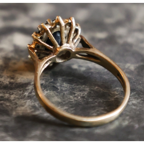 58 - Nine Carat Yellow Gold Sapphire and Diamond Ladies Cluster Ring Band Size O