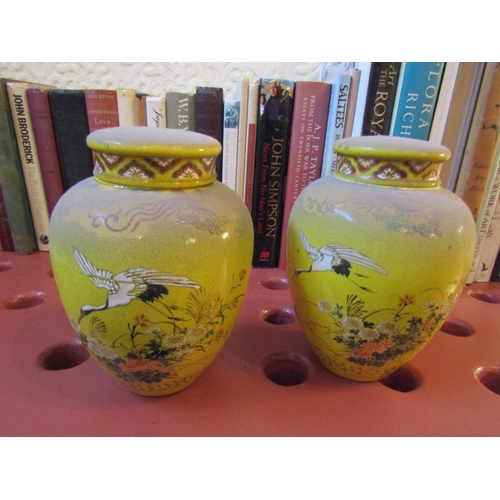 83 - Pair of Eastern Vases with Covers Yellow Ground with Avian Motif Decoration Each Approximately 9 Inc... 