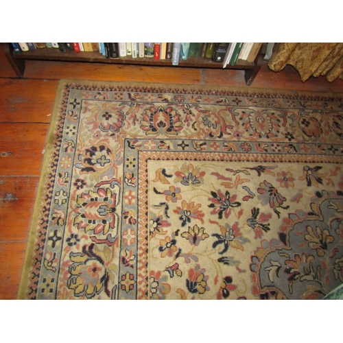 85 - Pure Wool Rug Cream Ground with Patterned Borders Approximately 10ft 6 Inches Long x 7ft 6 Inches Wi... 